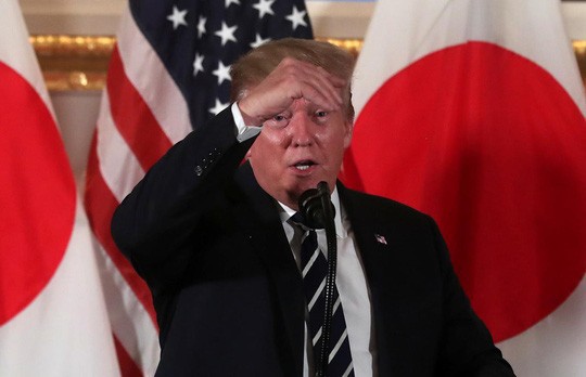 Ông Donald Trump vẫn tin tưởng ông Kim Jong-un, bất chấp 2 vụ phóng tên lửa  - Ảnh 1.