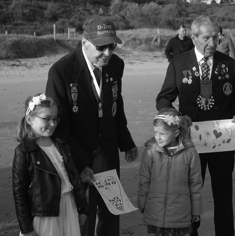 Charles Shay and Ray with two local children at Omaha Beach 2018 (c) Ray Lambert.jpg