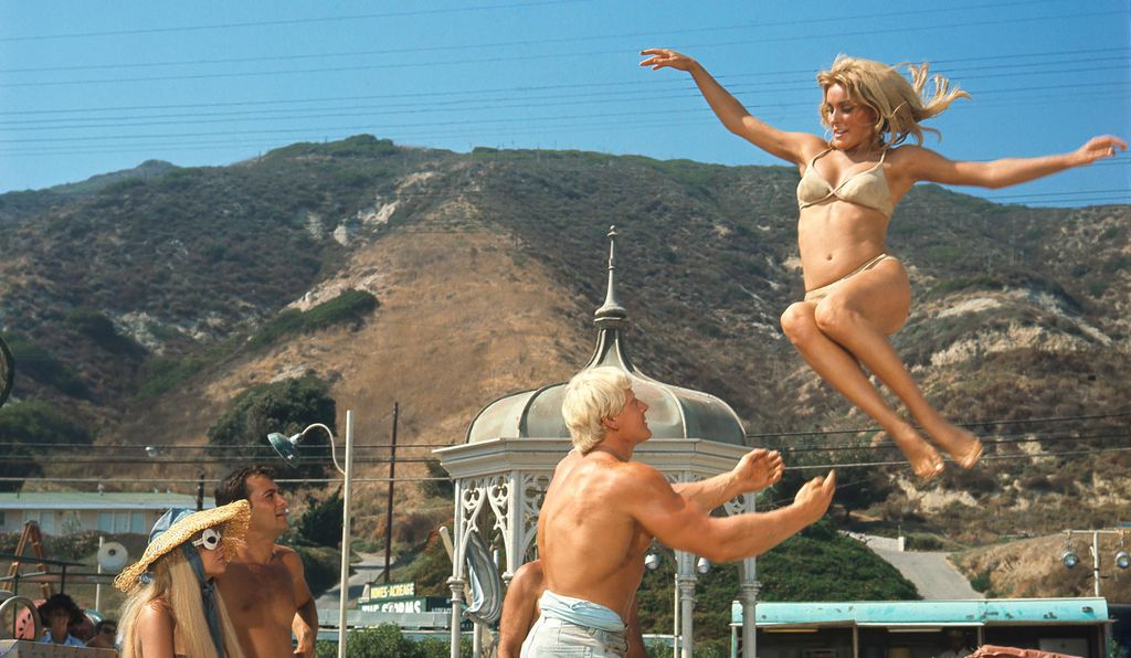 Actress Sharon Tate takes a leap in the film <em>Don
