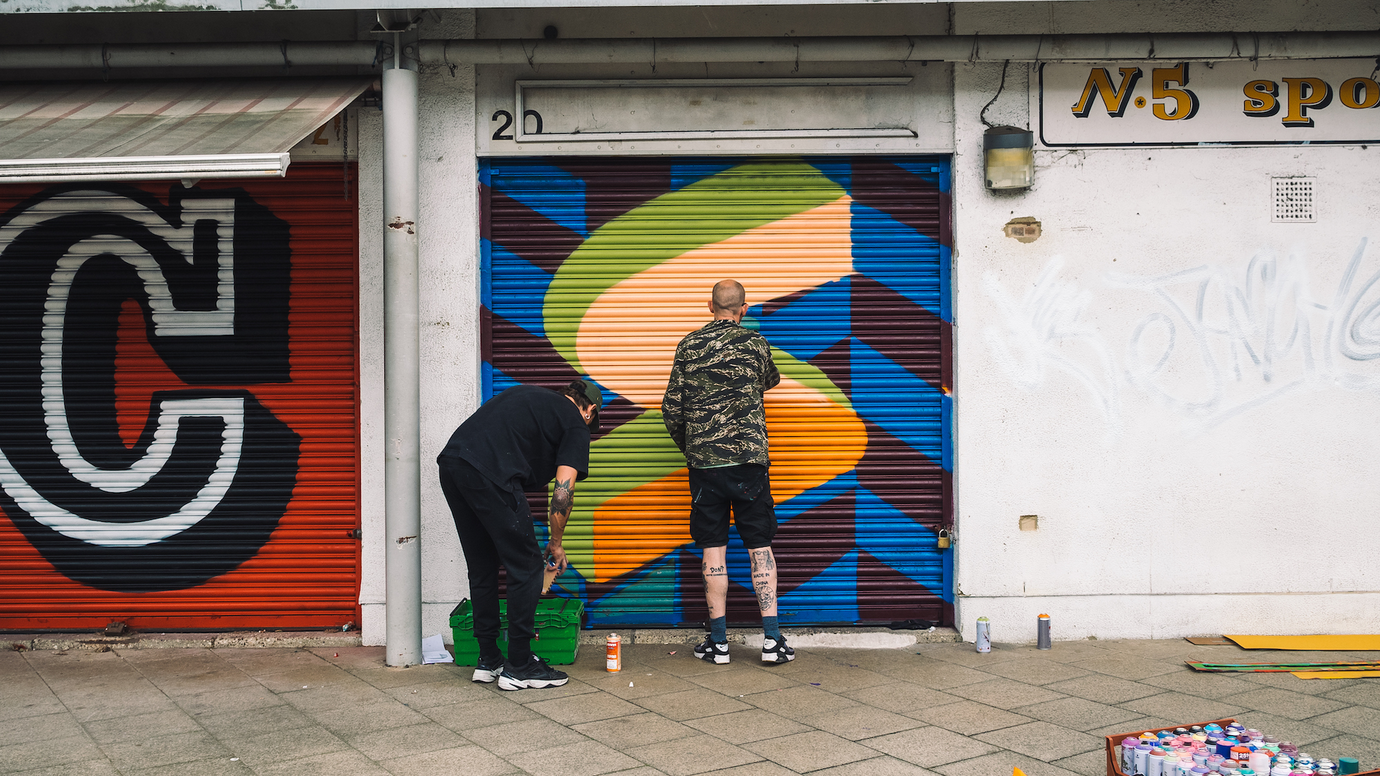 The Full English Alphabet Painted on Store Shutters in 26 Different Fonts by Ben Eine