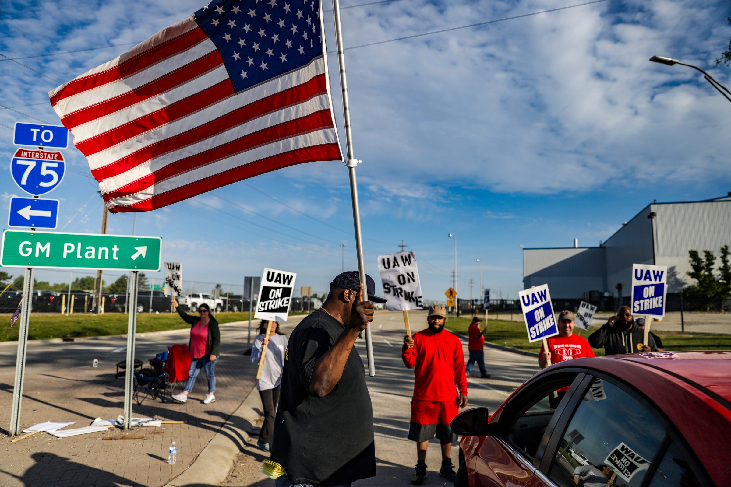 One week in, strikers worried, determined