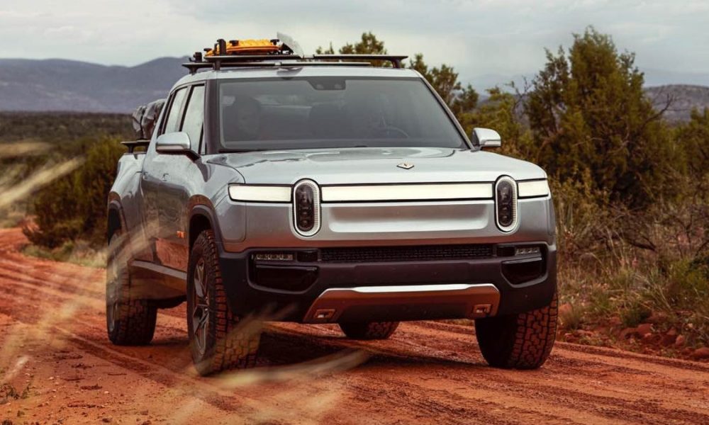 Bezos, Blue Origin crew ride in Rivian electric vehicle on their way to ...