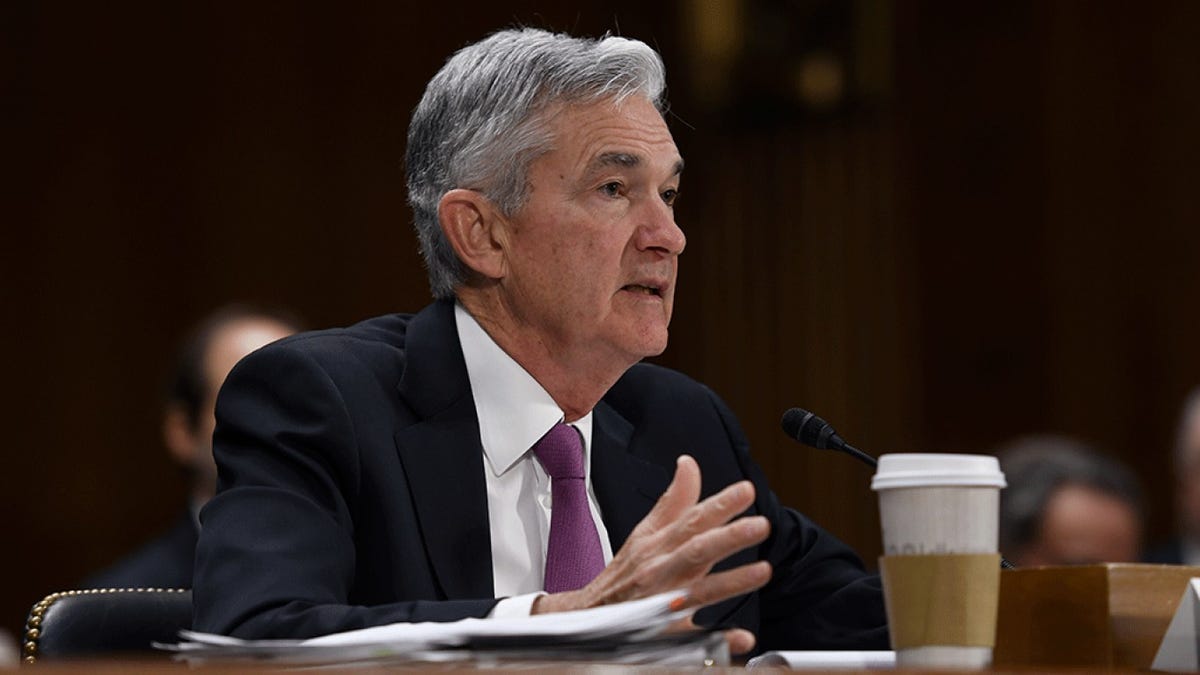 Powell: Progress toward full employment, 2% inflation is