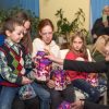 Charity Calendar participants and organizers congratulate orphans from the Living Hope Foundation on St. Nicholas Day